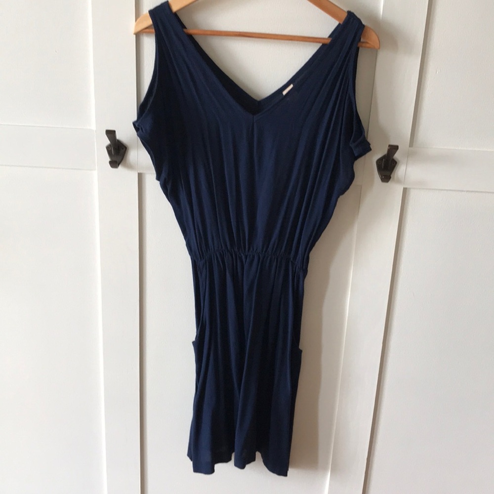Navy cutout sleeve dress with pockets.